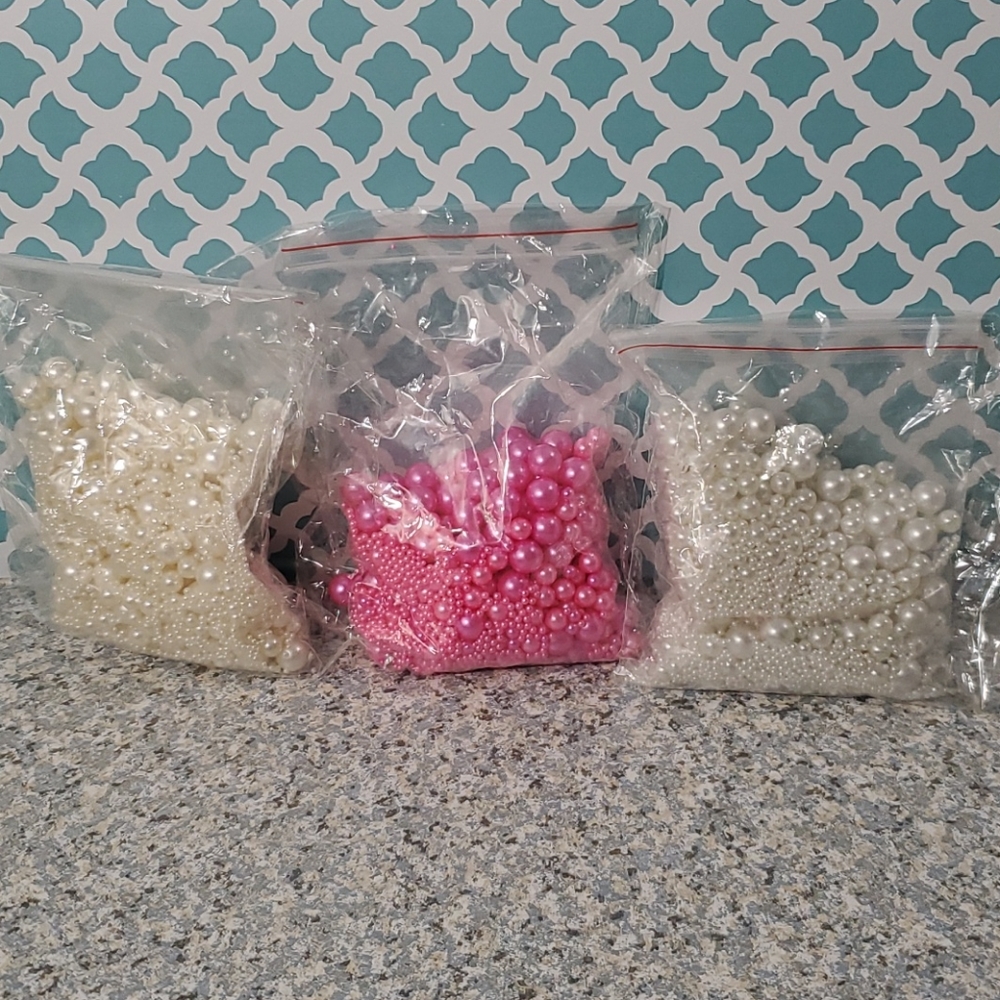 3 packs of brand new loose pearl beads.